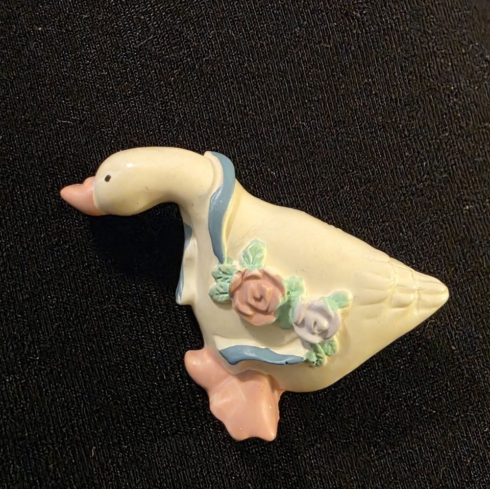 Charming Goose Pin with Floral Accents